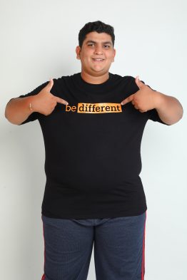 Particle's plus size "Be Different" t-shirt — bold orange graphic in 100% cotton.